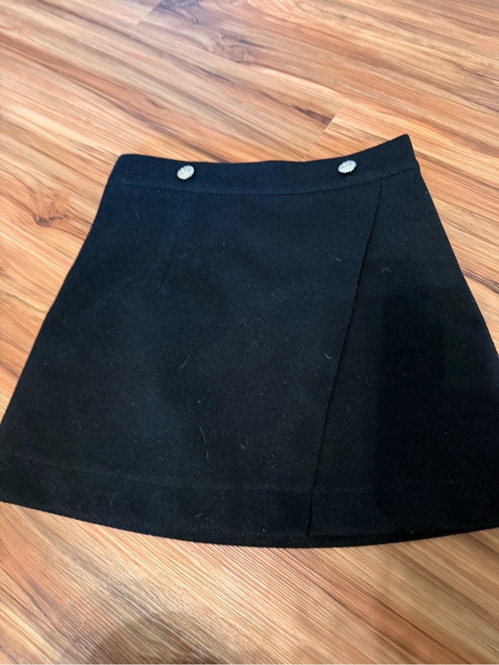 Black A-Line Mini Skirt with Decorative Buttons